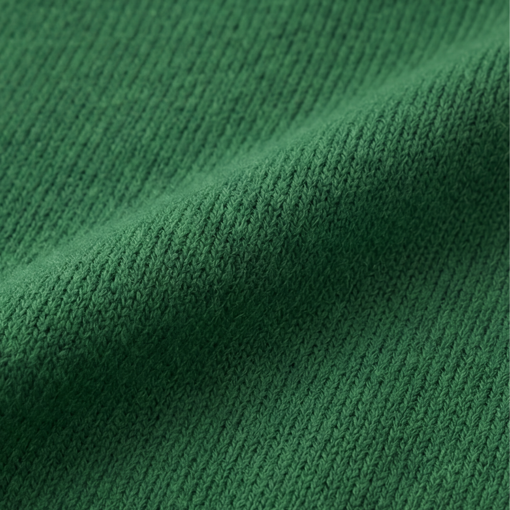 Adalyn asymmetric collar knit sweater, worn at a cafe table