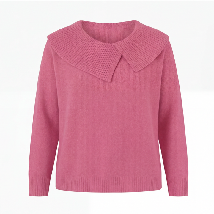 Adalyn asymmetric collar knit sweater, worn at a cafe table