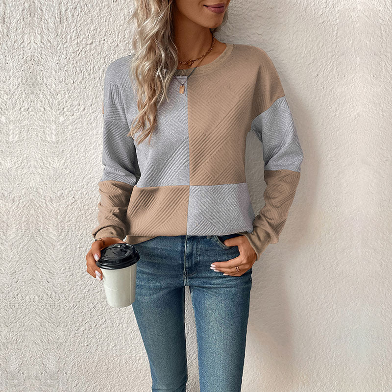 Adeline khaki and gray colorblock sweatshirt, front view with shoulder bag