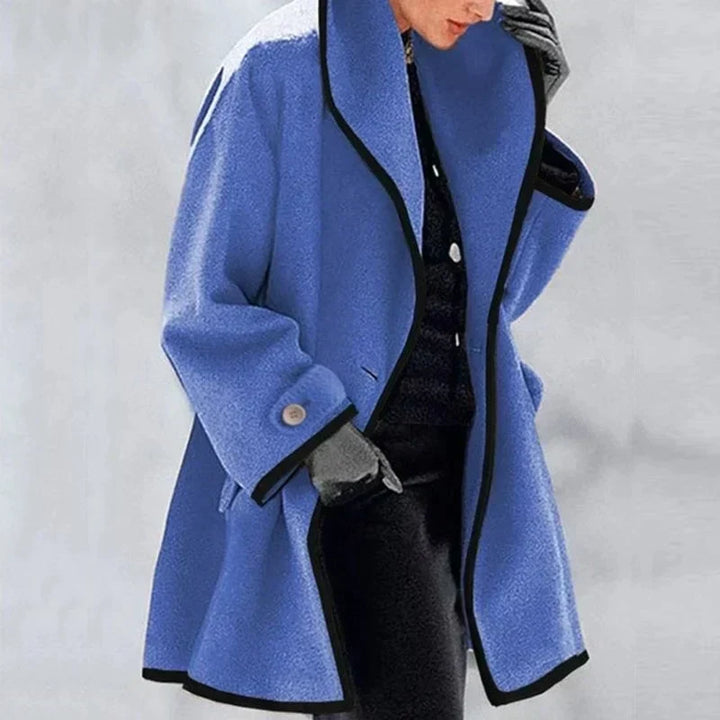 Adeline blue trench coat with contrast trim, front view