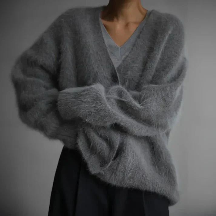 Adeline fuzzy cardigan in gray, arms crossed close-up