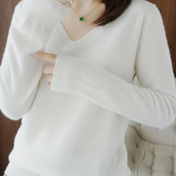Adeline relaxed V-neck sweater in white, close-up detail