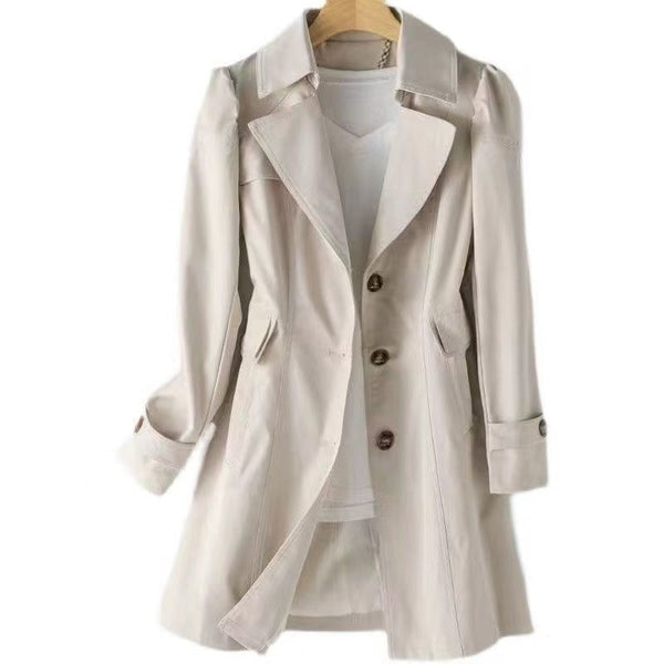 Adeline single-breasted trench coat in off-white, front view on hanger