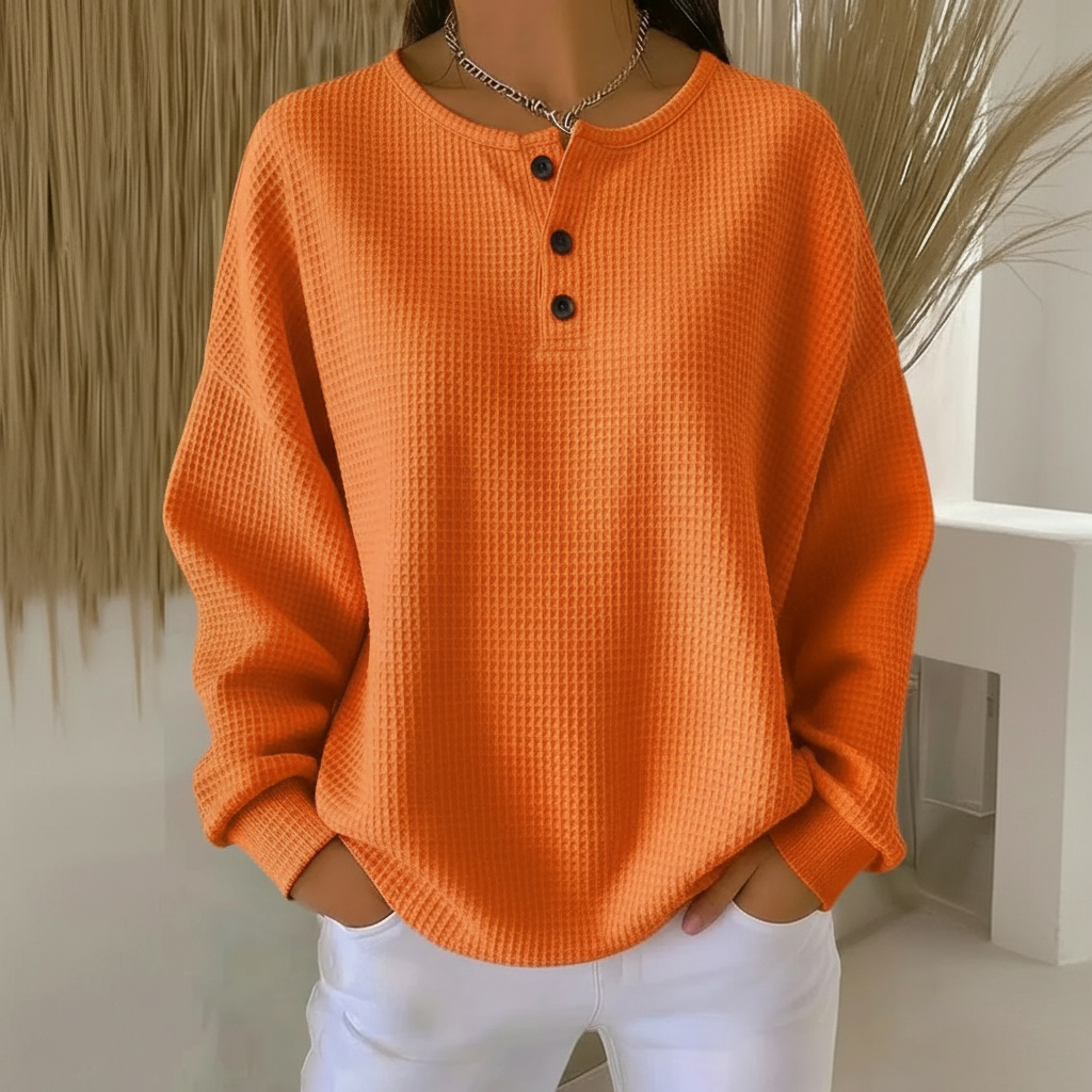 Adeline waffle knit henley sweater in orange, front view