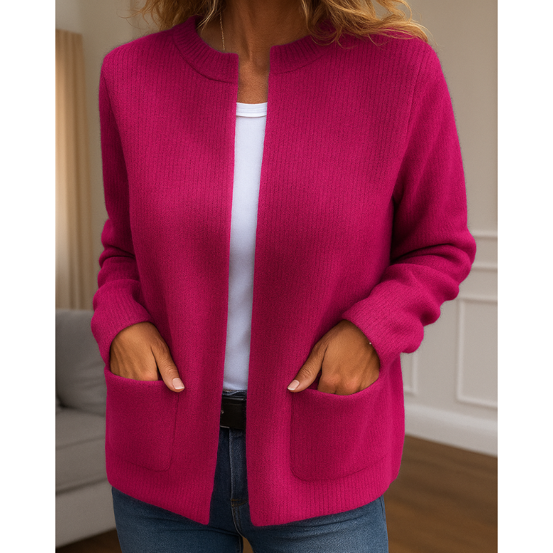 Pink ribbed knit zip-up cardigan, close-up front view with pockets