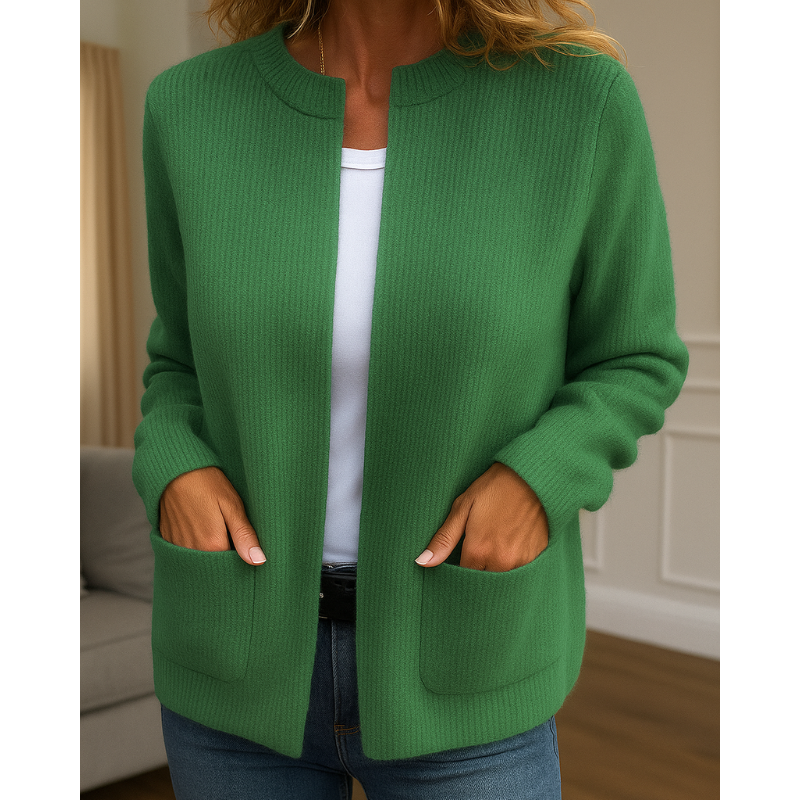 Green ribbed knit zip-up cardigan, close-up front view with pockets