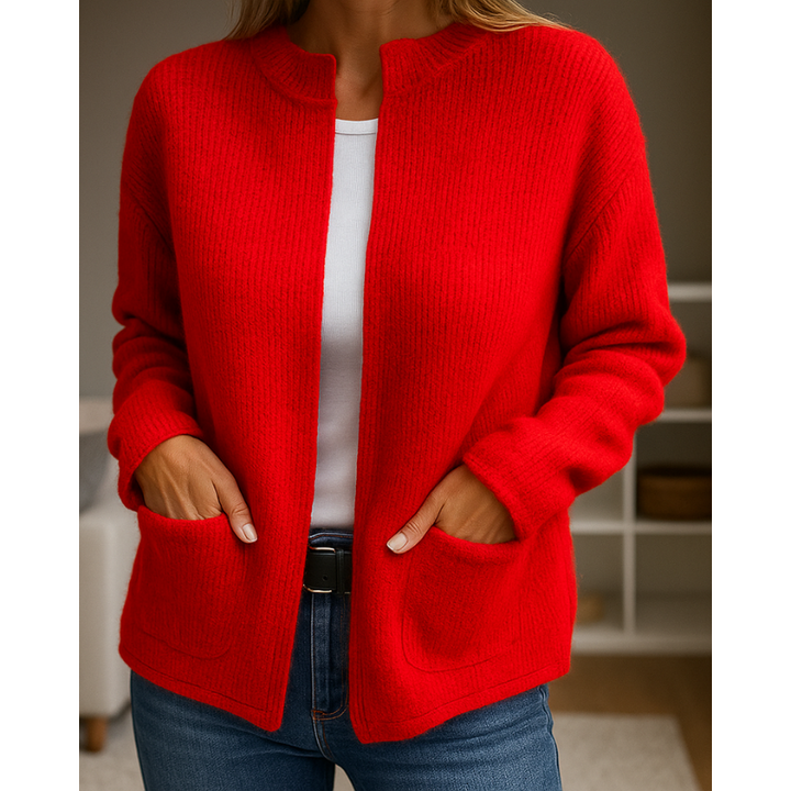 Red ribbed knit zip-up cardigan, close-up front view with pockets