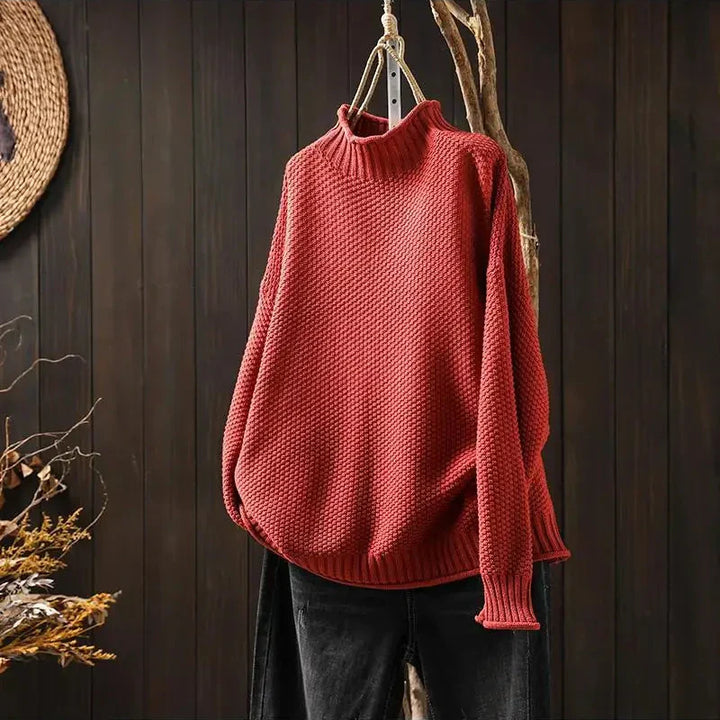 Amara oversized mock neck sweater in red, front view