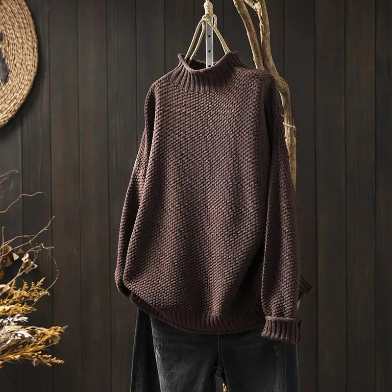 Amara oversized mock neck sweater in brown, front view