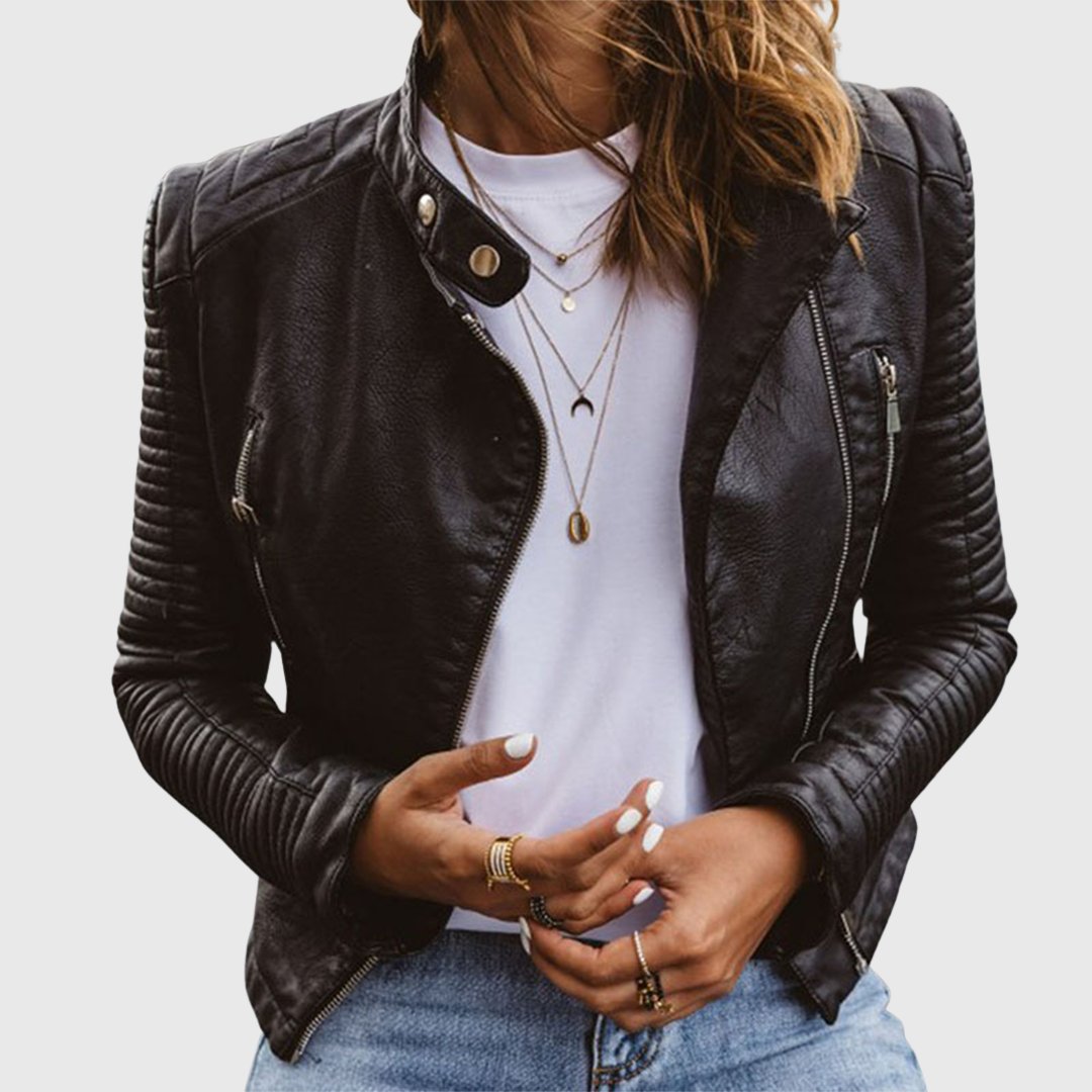 Front view of Amelie fitted biker jacket with stand collar and layered necklaces