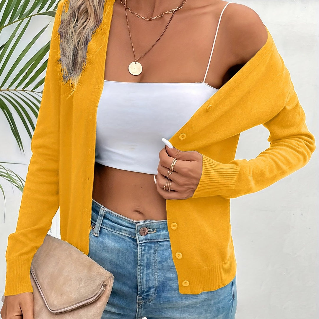 Annabel button-front V-neck cardigan in bright yellow, close-up off-shoulder view