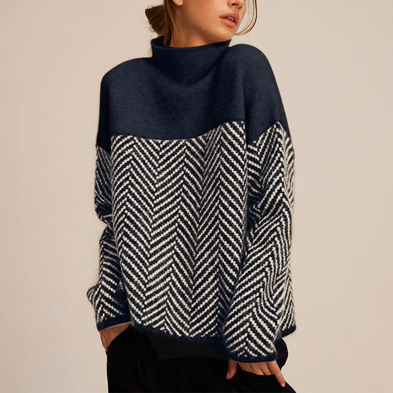 Arla turtleneck sweater with chevron pattern in navy and white, side view