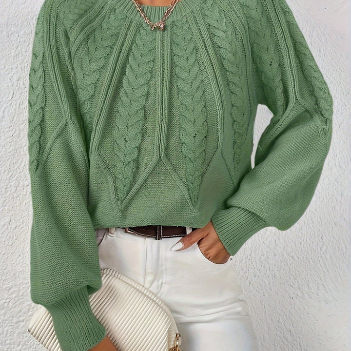 Astrid green cable-knit sweater, close-up texture view