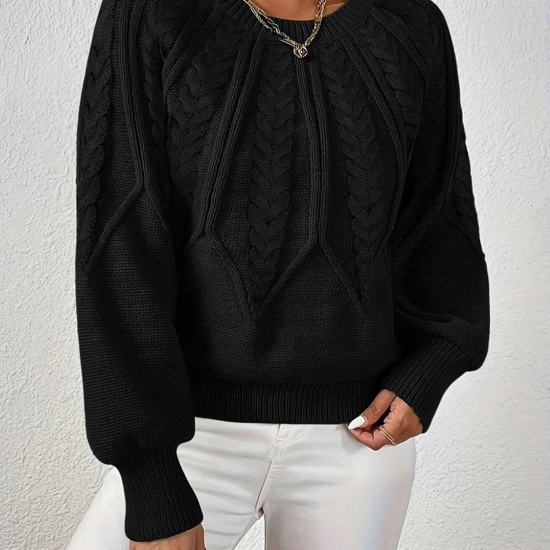 Astrid black cable-knit sweater, close-up detail