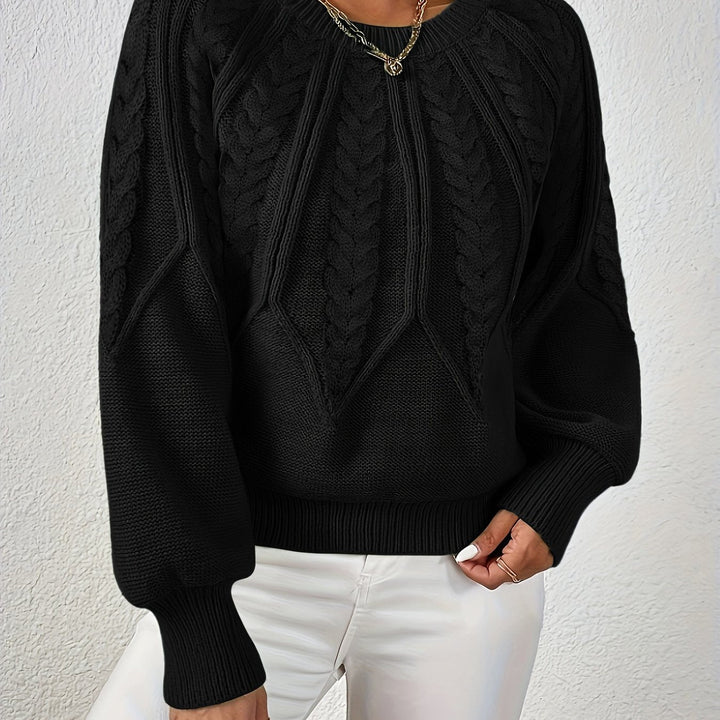 Astrid black cable-knit sweater, close-up detail
