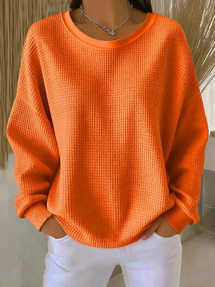 Blair oversized waffle knit sweater in orange, front view