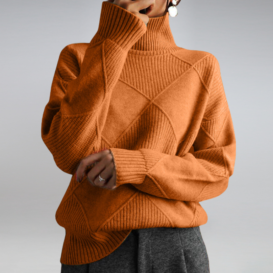 Orange turtleneck sweater with ribbed cuffs, front view