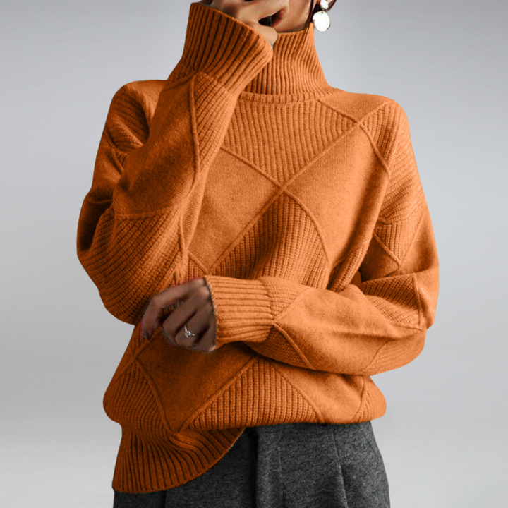 Orange turtleneck sweater with ribbed cuffs, front view