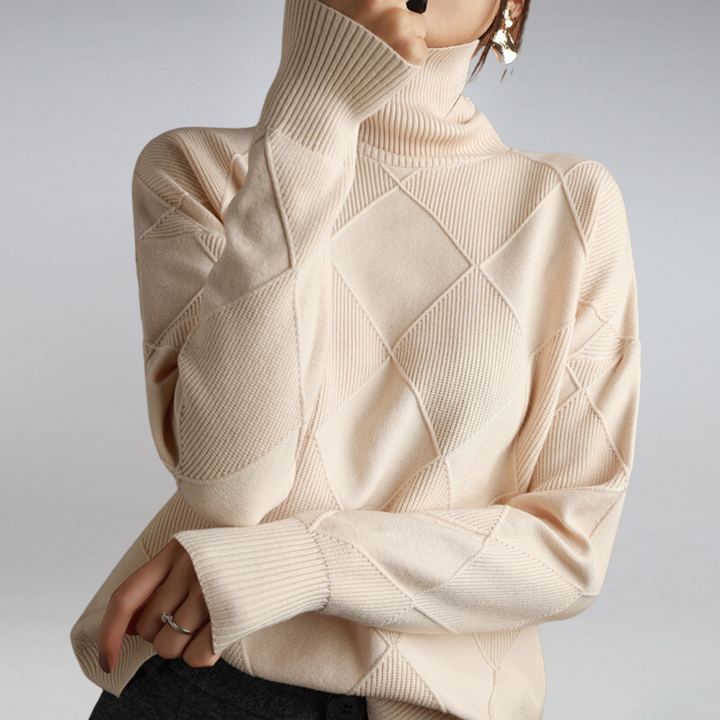Cream turtleneck sweater with diamond knit pattern, front view
