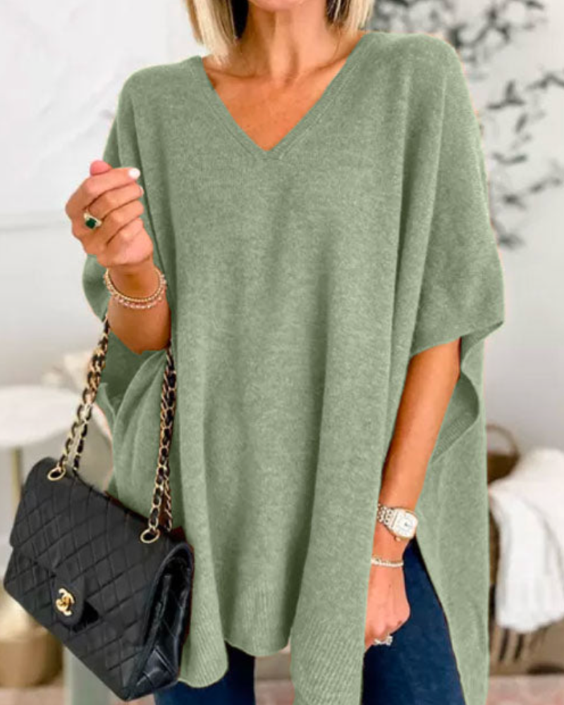 Camille oversized V-neck poncho sweater in light grey, front view