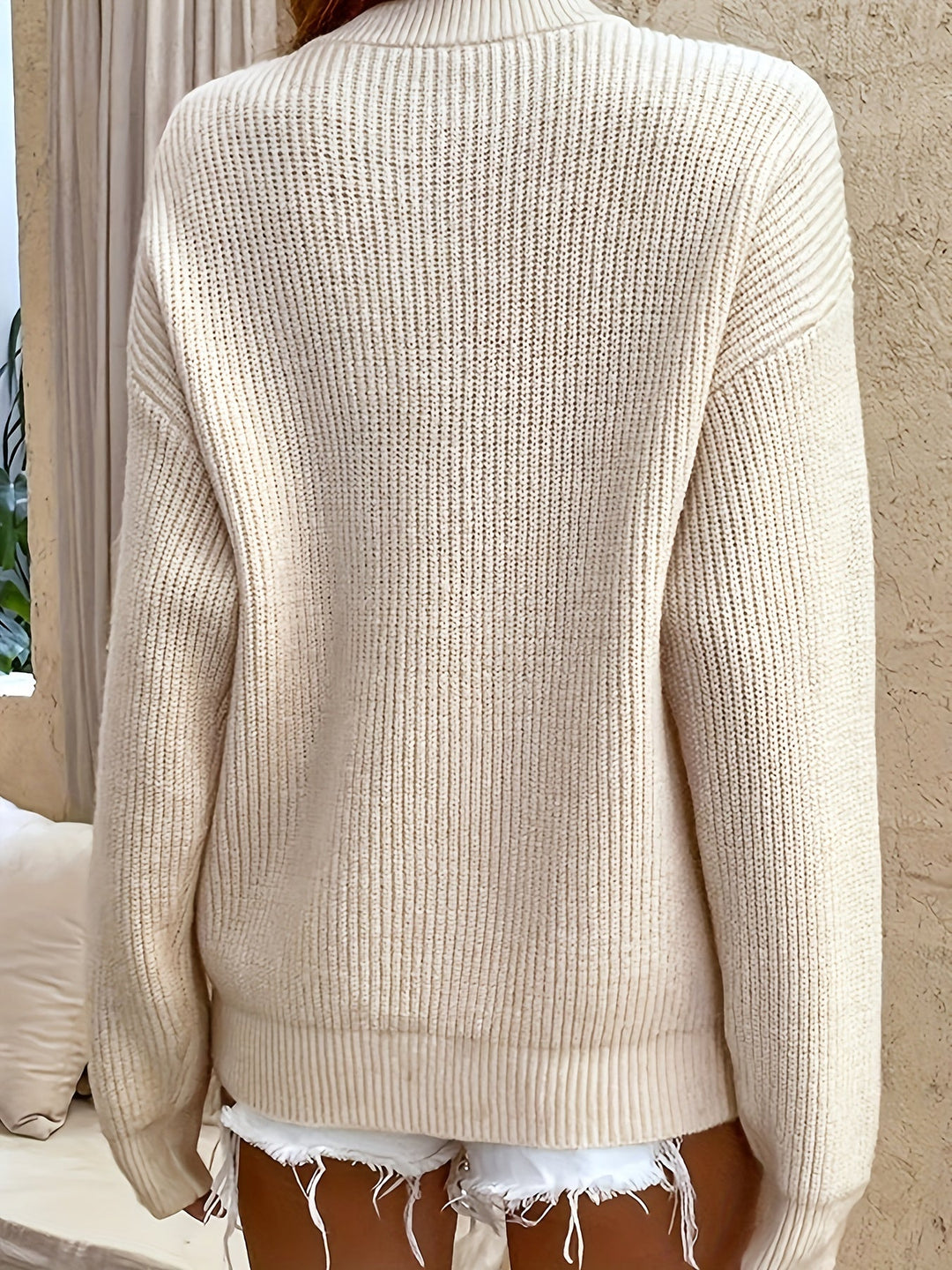 Camille black ribbed button neck sweater, front view