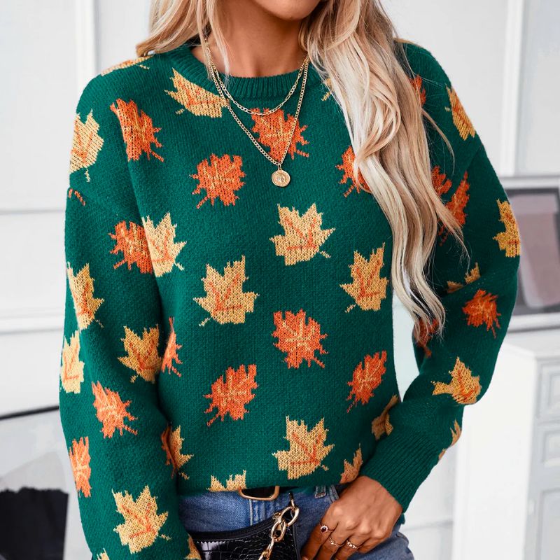 Clementine leaf print crew neck sweater, front view with layered necklaces