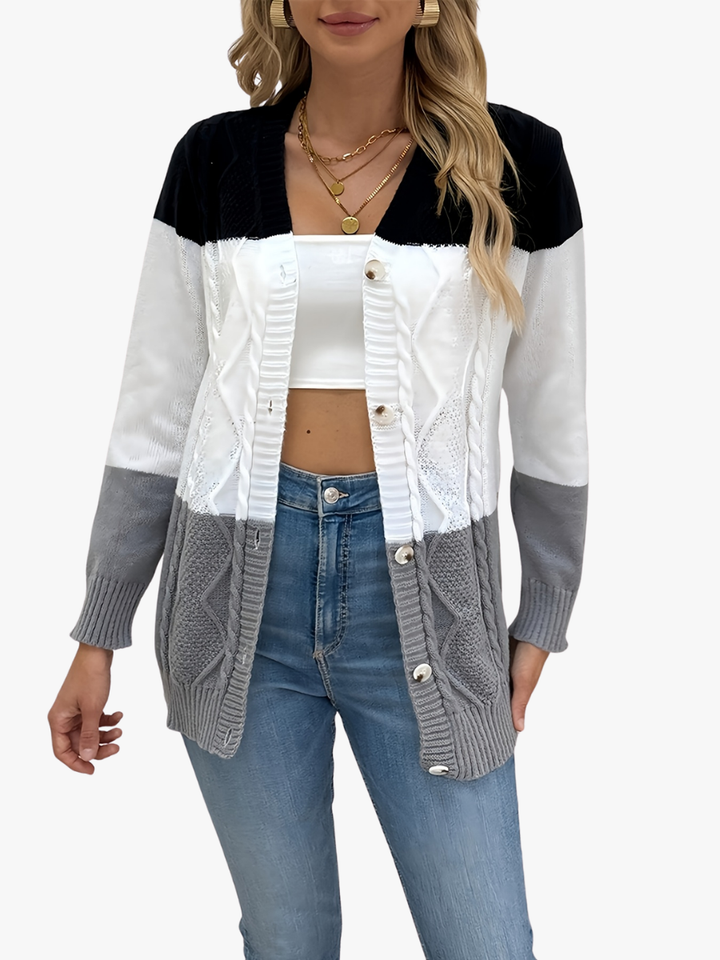 Colette colorblock cable knit cardigan, front view with button detail