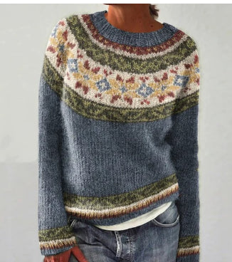 Blue fair isle knit sweater with patterned yoke, front view