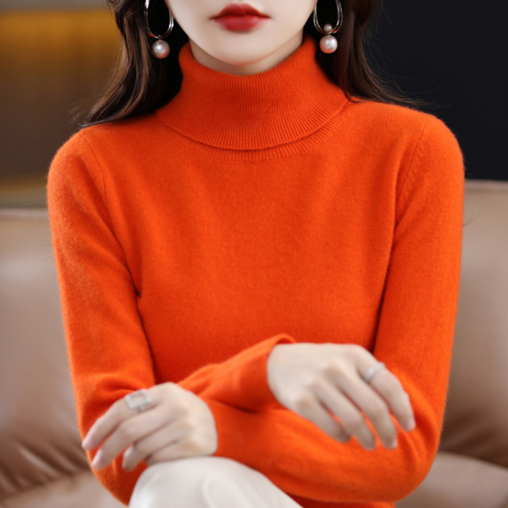 Emmie cashmere turtleneck sweater in orange, close-up view