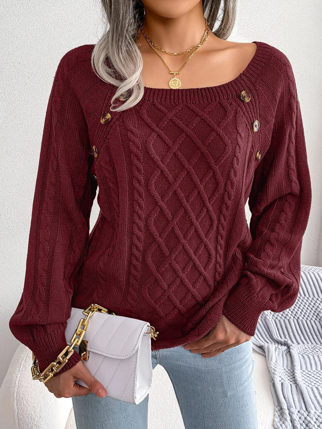 Everly cable knit sweater with square neck and button detail, front view in wine