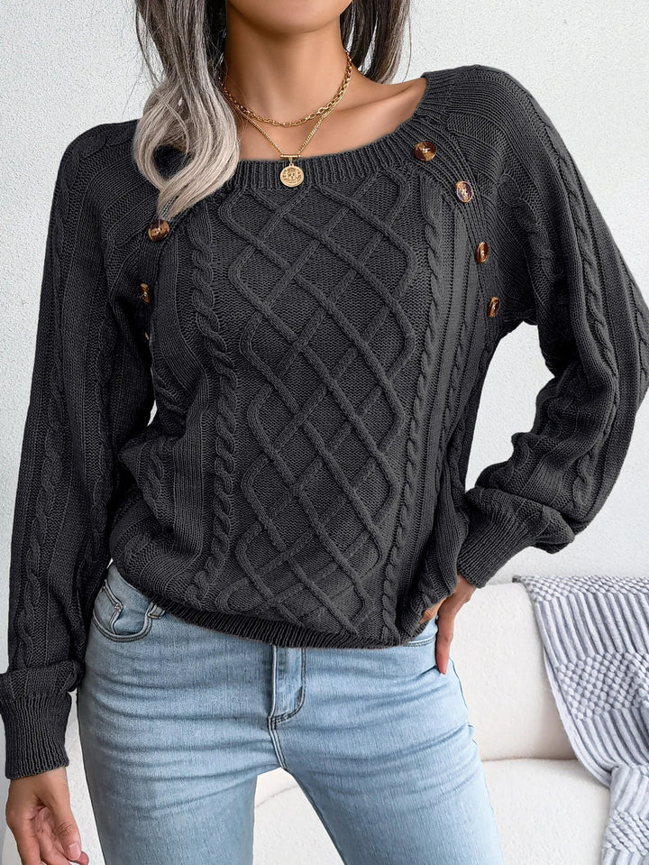 Everly cable knit sweater with square neck and button detail, front view in charcoal