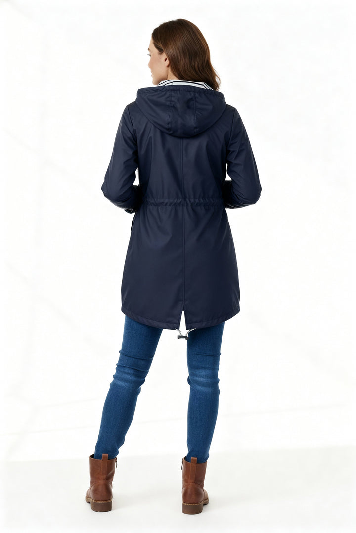Everly navy rain jacket full length back view with boots