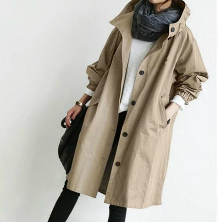 Everly hooded oversized trench coat in khaki, front view with hands in pockets