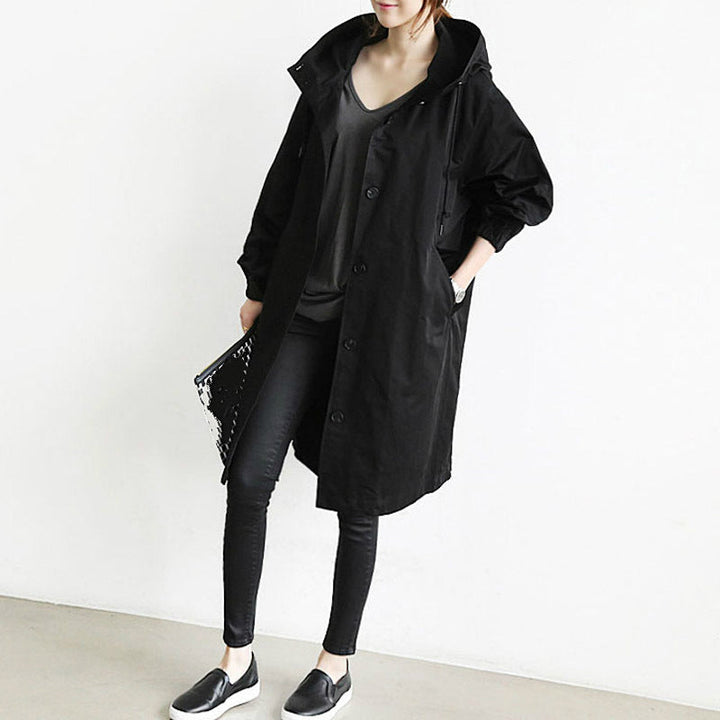 Everly hooded oversized trench coat in black, front view styled with a v-neck top