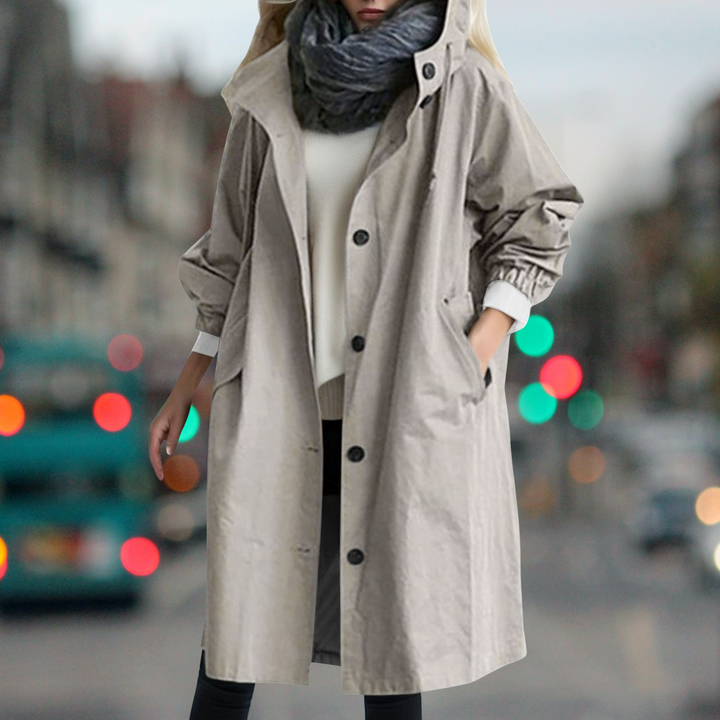 Everly hooded trench coat in beige, front view with hands in pockets