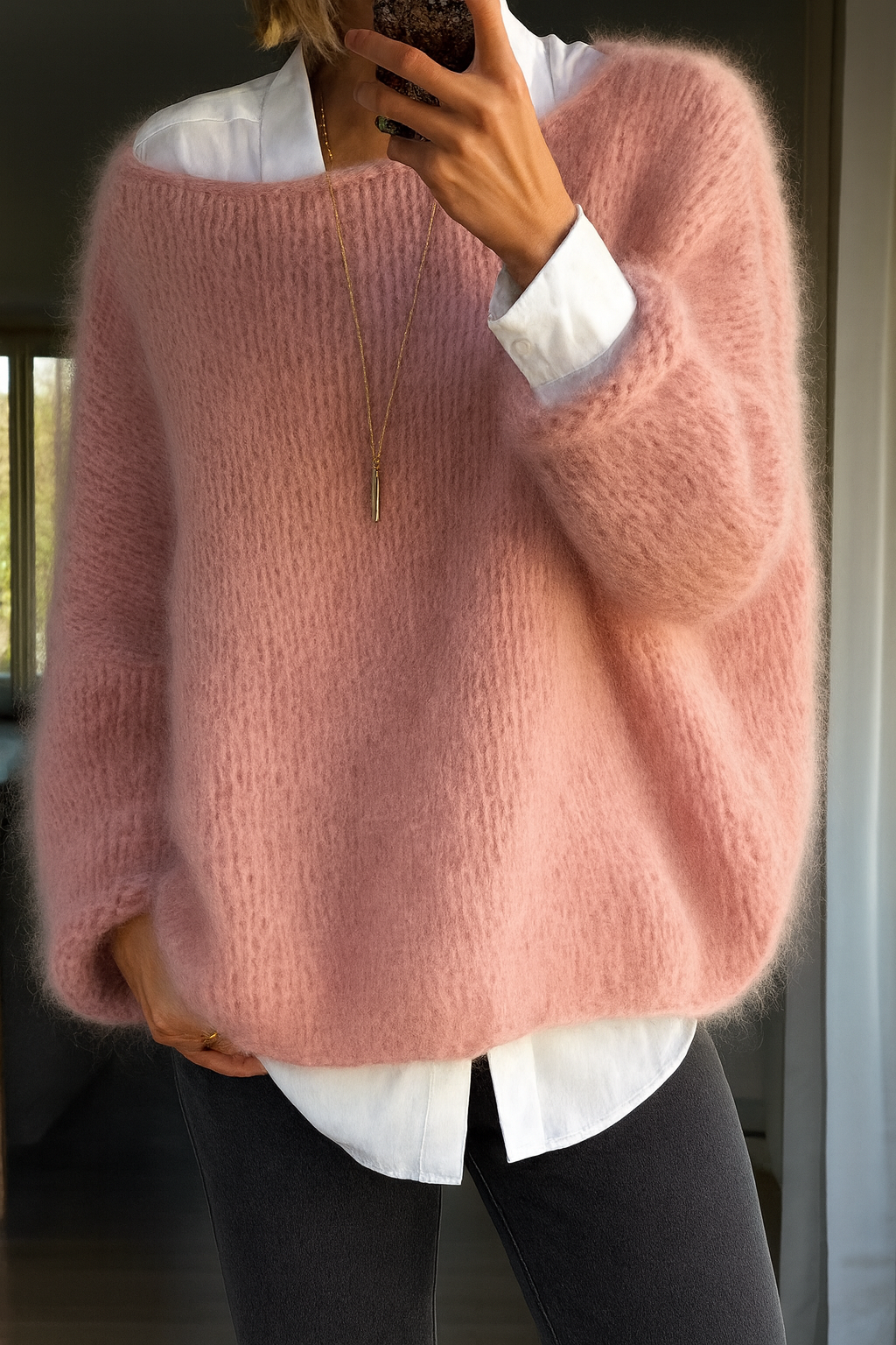Everly oversized boat neck sweater in pink, layered over white shirt, front view