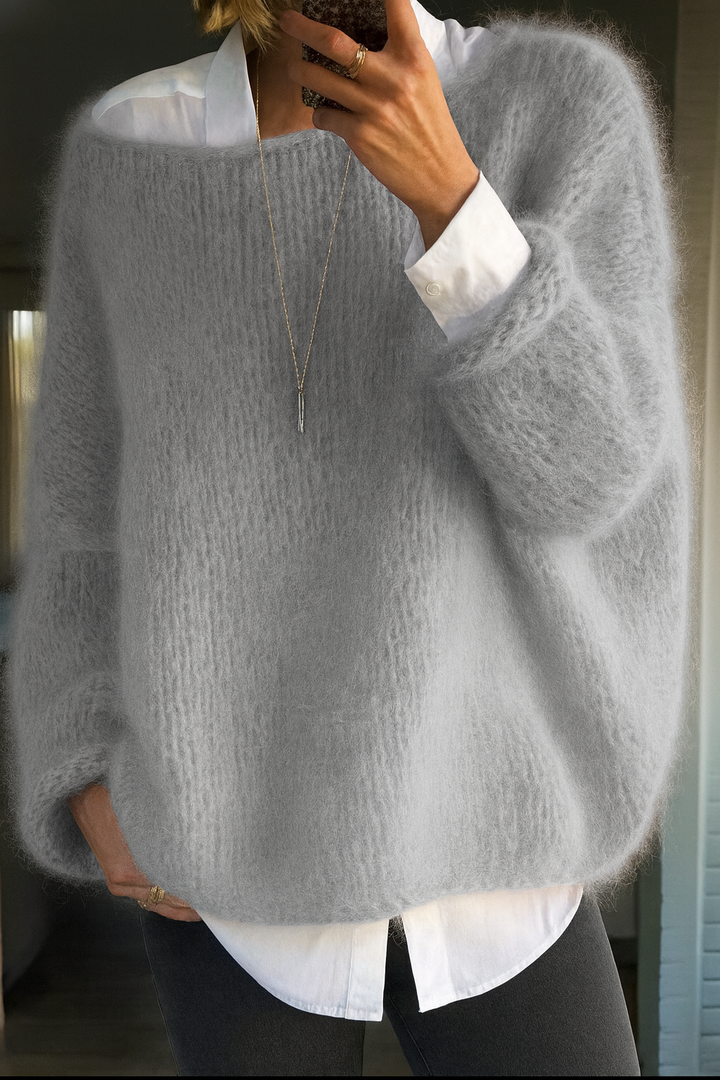 Everly oversized boat neck sweater in gray, layered over white shirt, front view