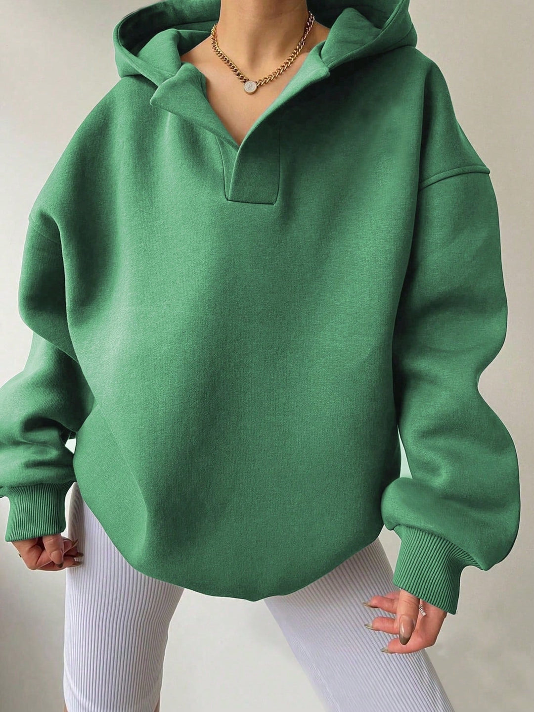 Harlow oversized collared hoodie in green, front view close-up