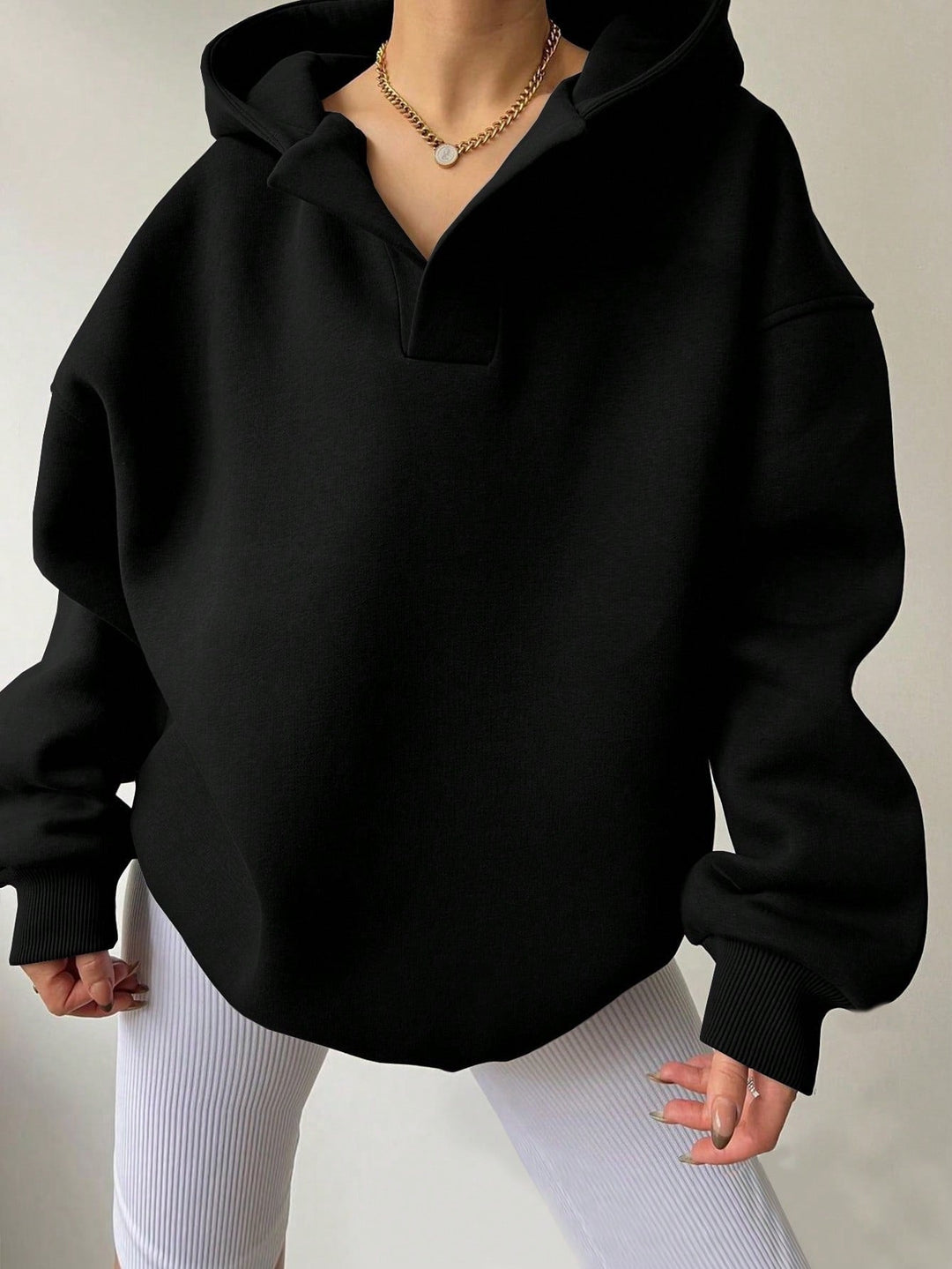 Harlow oversized collared hoodie in black, front view close-up