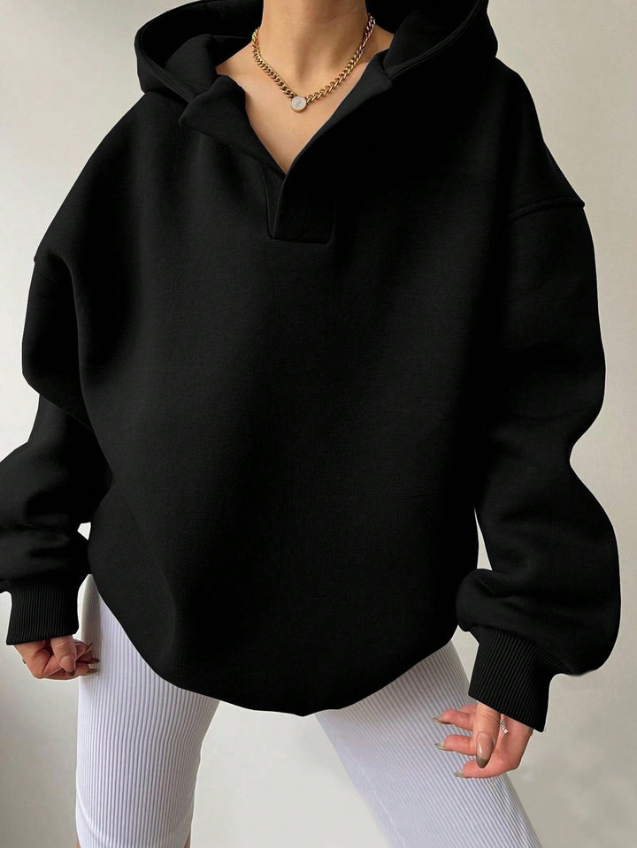 Harlow oversized collared hoodie in black, front view close-up