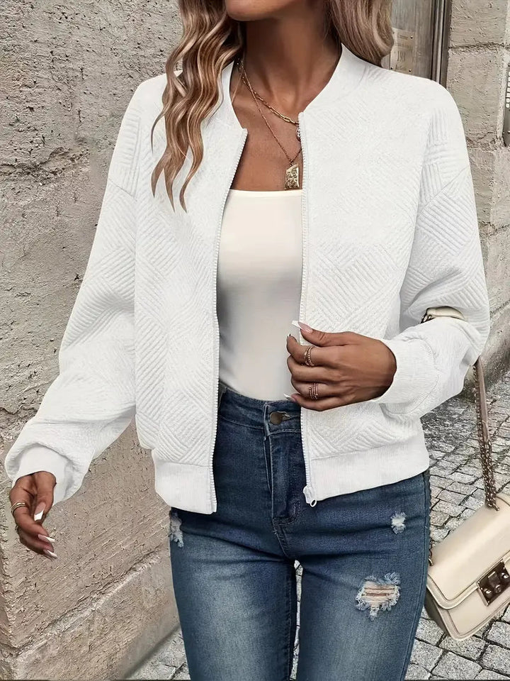 Harlow textured zip-up cropped bomber jacket in white, front view with bag