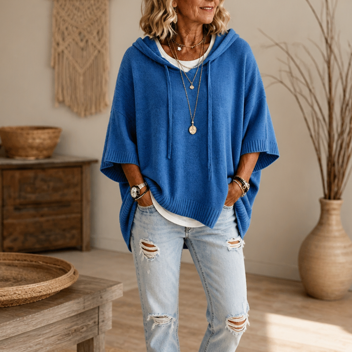 Harlowe oversized hooded sweater in pink stripe, walking pose
