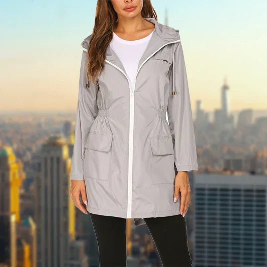 Harper hooded rain jacket in gray, front view over white top