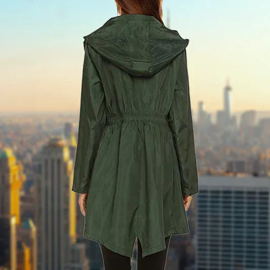 Harper hooded rain jacket in dark green, back view showing longline hem