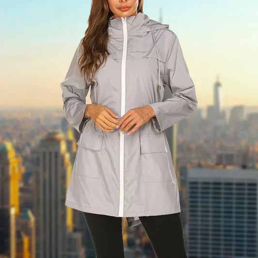Harper hooded rain jacket in gray, close-up front view fully zipped with hood up