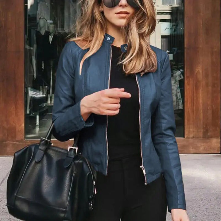 Harper cropped moto jacket in navy blue faux leather, front view