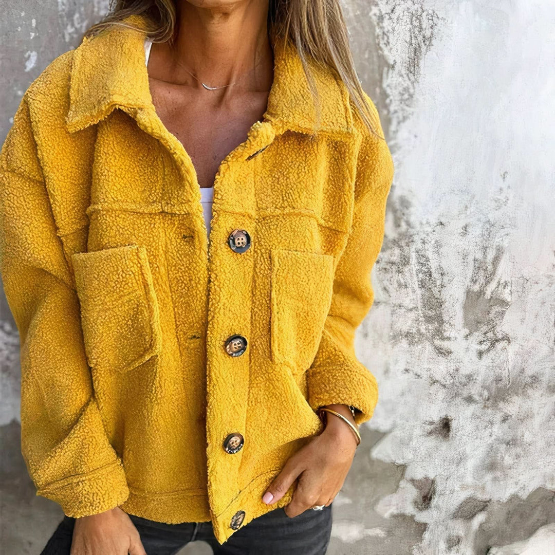 Harriet yellow sherpa jacket with collar and button front, close-up view
