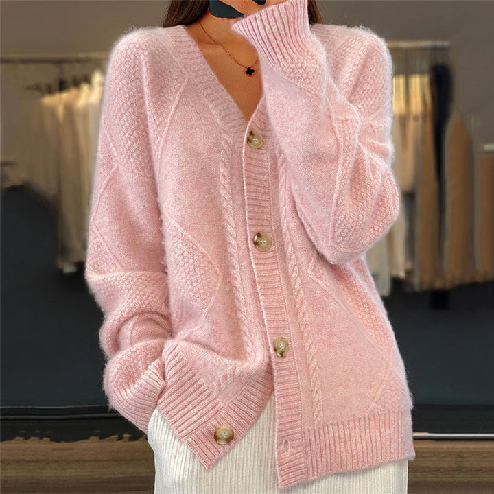 Hensley pink cable knit V-neck cardigan, front view close-up