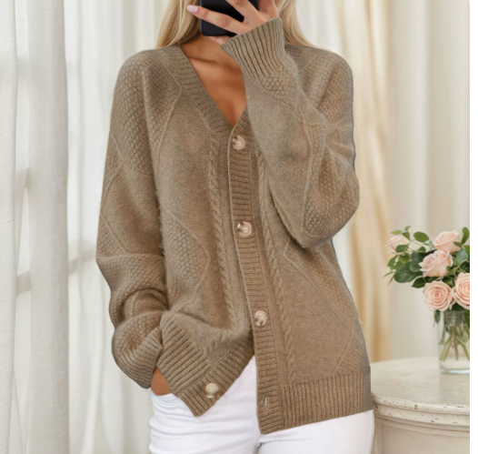 Hensley camel cable knit V-neck cardigan, styled with white pants