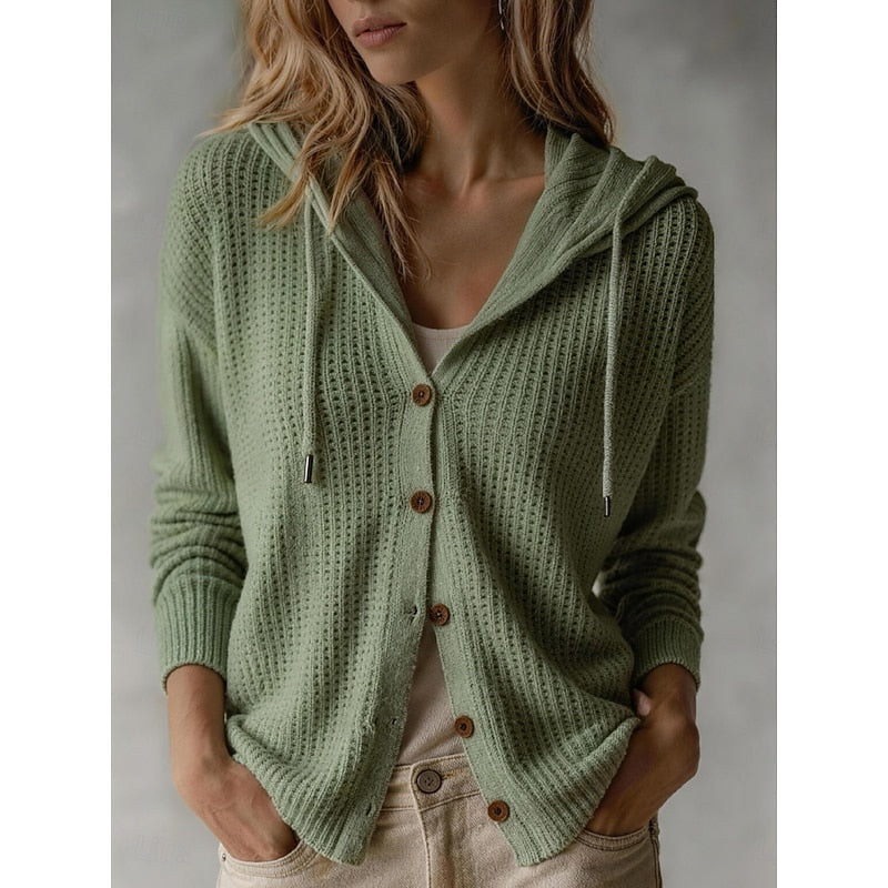 Isla hooded waffle knit cardigan in sage green, front view with hands in pockets
